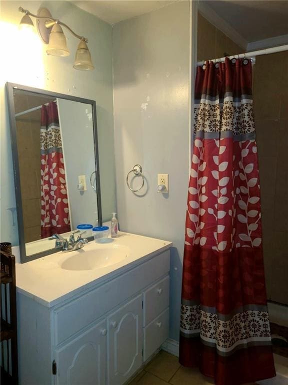 full bathroom with tile patterned floors, curtained shower, and vanity