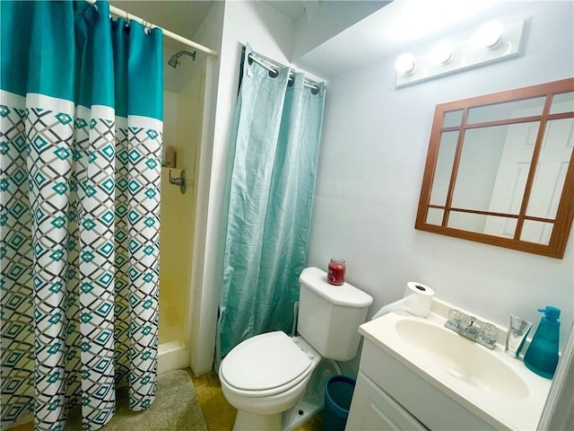 bathroom with a shower with shower curtain, vanity, toilet, and tile patterned flooring