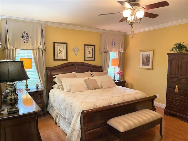 9849 Aspen Cir, Daphne, AL 36527 - bedroom with ornamental molding, wood finished floors, and ceiling fan