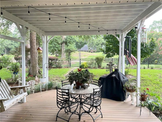 9849 Aspen Cir, Daphne, AL 36527 - wooden terrace with a fenced backyard, outdoor dining area, and grilling area