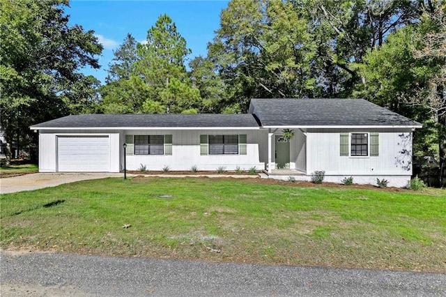 single story home with a garage and a front lawn