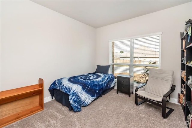 bedroom with light colored carpet