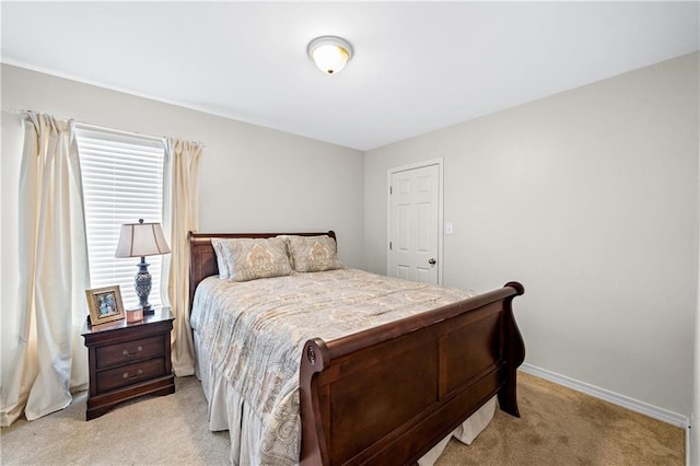 bedroom with light carpet