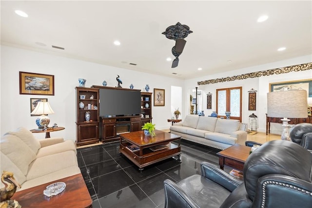 living room with dark tile flooring