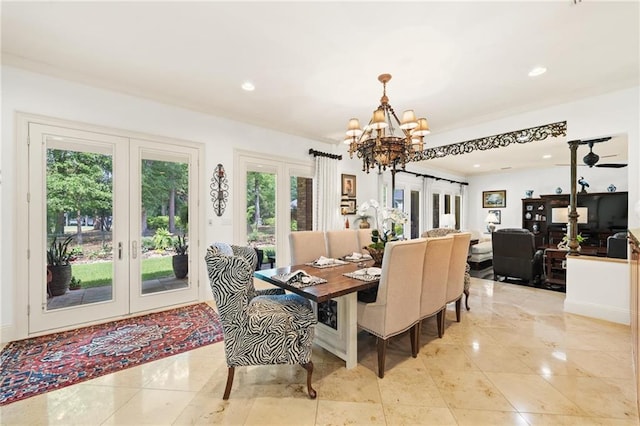 tiled dining area with french doors and a chandelier