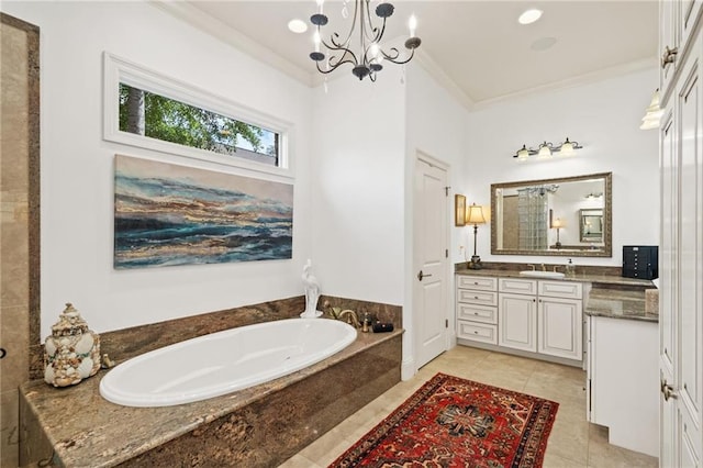 bathroom with oversized vanity, tiled tub, crown molding, tile floors, and an inviting chandelier