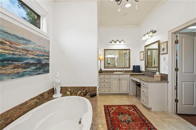 bathroom featuring a tub, vanity, crown molding, and tile flooring