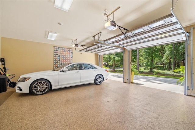 garage featuring a garage door opener