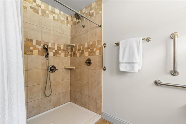 bathroom with a shower with shower curtain