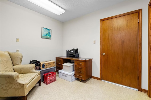 office area featuring a textured ceiling