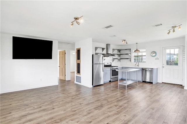 unfurnished living room featuring light hardwood / wood-style floors