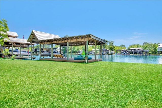 view of dock featuring a yard and a water view