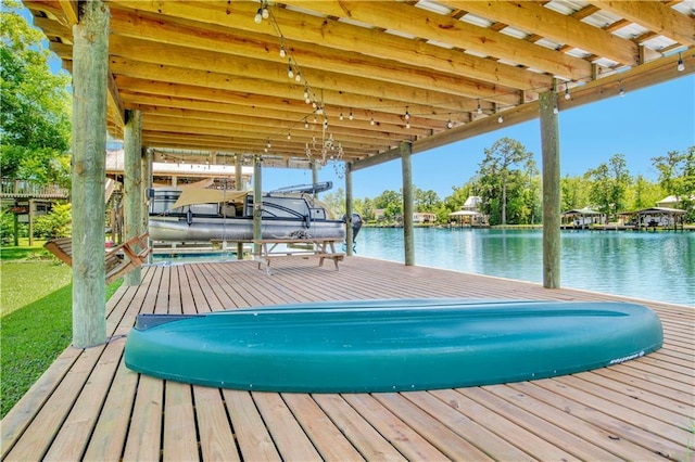 view of dock with a water view