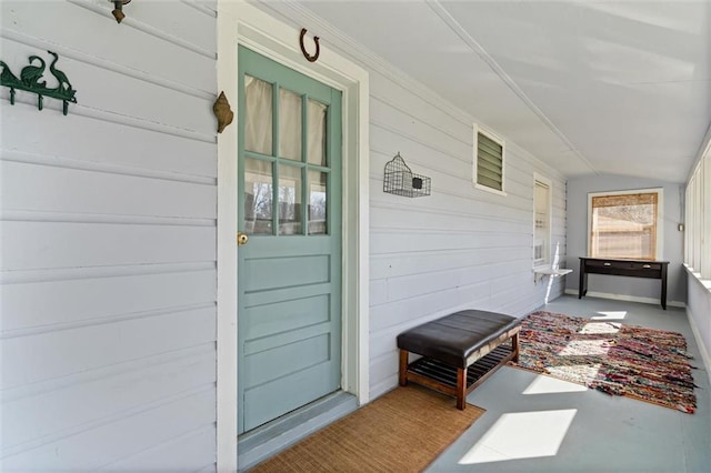 entrance to property with covered porch