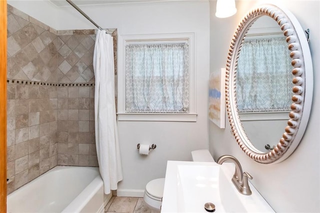 full bathroom with tile patterned flooring, toilet, shower / bathtub combination with curtain, and sink