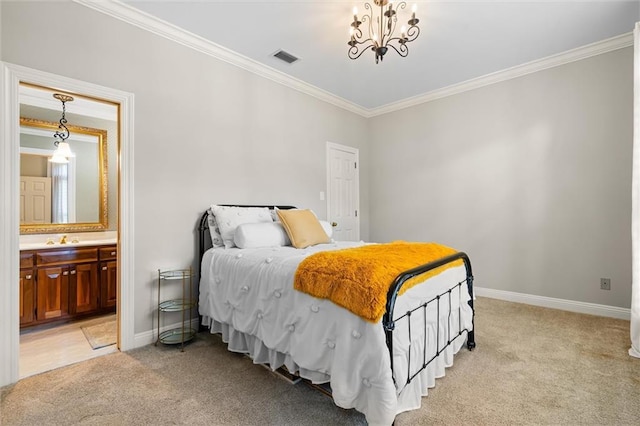 carpeted bedroom with sink, crown molding, ensuite bath, and an inviting chandelier