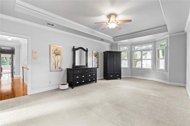 bedroom featuring ceiling fan, carpet, crown molding, and multiple windows