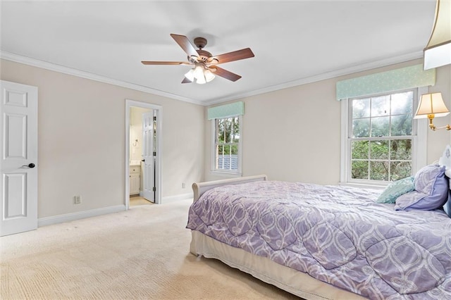 bedroom with ceiling fan, ornamental molding, connected bathroom, and light colored carpet