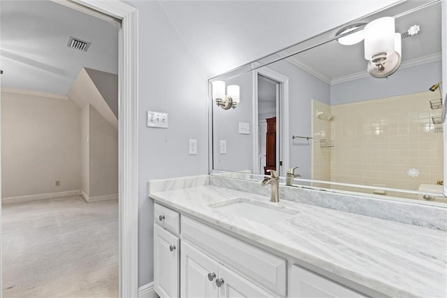 bathroom with a shower, vanity, and crown molding