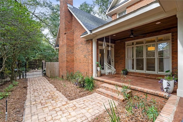 exterior space featuring ceiling fan