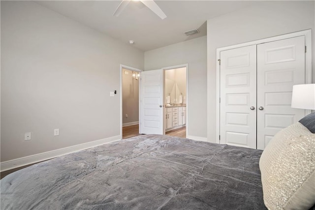 bedroom with ceiling fan, a closet, and hardwood / wood-style floors