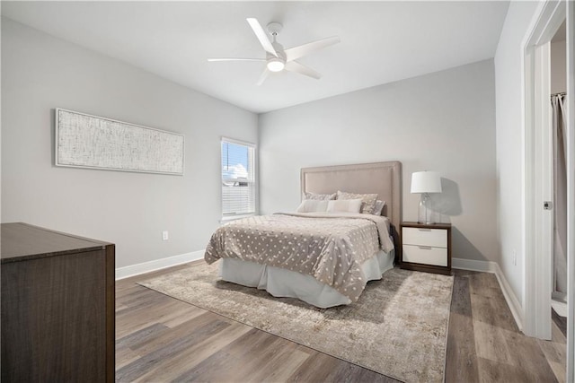 bedroom featuring ceiling fan and wood-type flooring