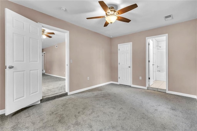 unfurnished bedroom featuring visible vents, baseboards, a ceiling fan, and carpet flooring