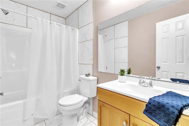 bathroom featuring shower / bath combo with shower curtain, visible vents, vanity, and toilet