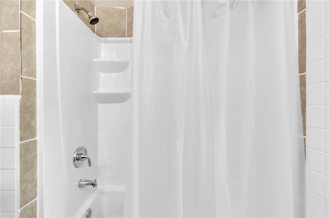 full bath with shower / bathtub combination with curtain