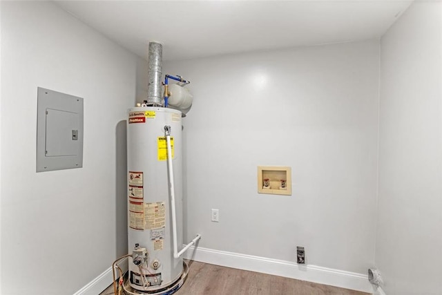 utility room featuring gas water heater