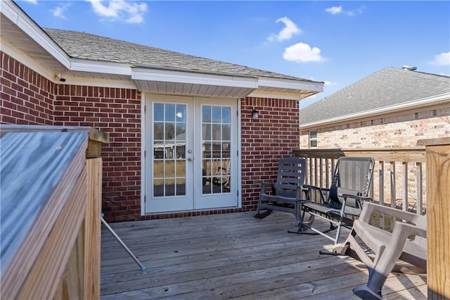 wooden deck featuring french doors