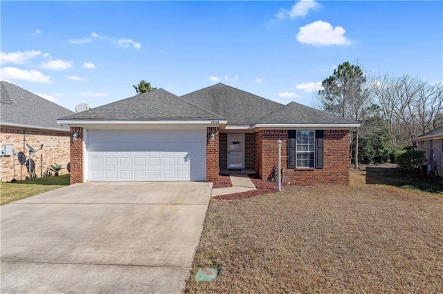 single story home featuring a front yard and a garage