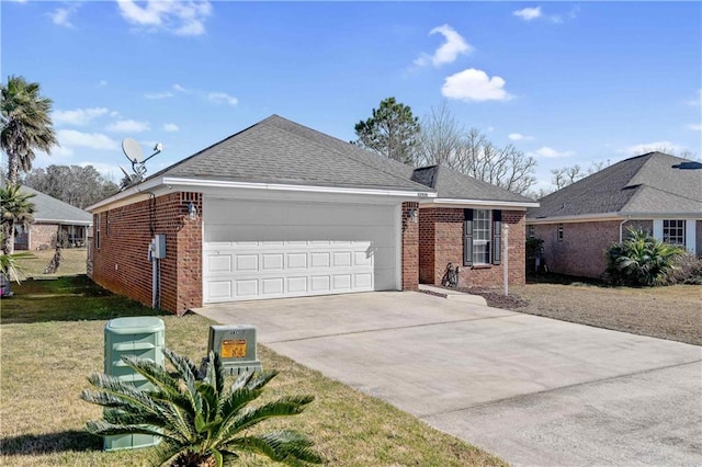 ranch-style home featuring a garage and a front lawn