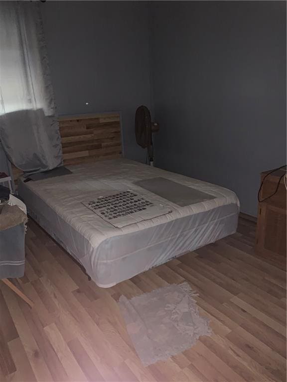 bedroom featuring light wood-type flooring