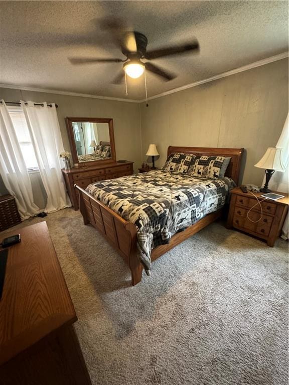 bedroom with crown molding, ceiling fan, carpet flooring, and a textured ceiling