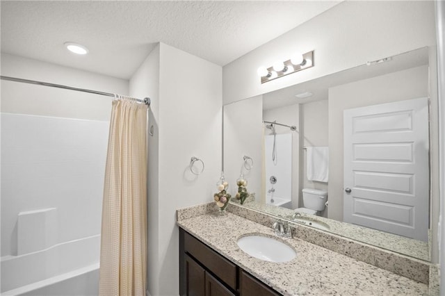 8320 Ogilvy Ct, Daphne, AL 36526 - bathroom featuring vanity, a textured ceiling, shower / bath combo, and toilet