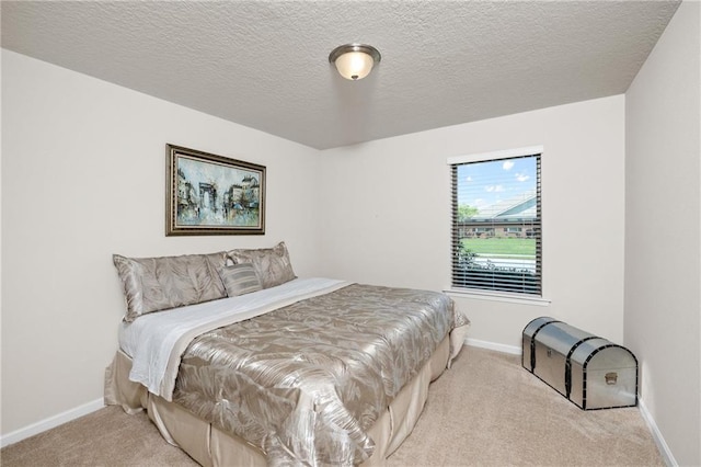8320 Ogilvy Ct, Daphne, AL 36526 - carpeted bedroom featuring baseboards and a textured ceiling