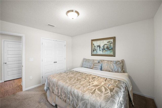 8320 Ogilvy Ct, Daphne, AL 36526 - carpeted bedroom featuring baseboards, visible vents, and a closet