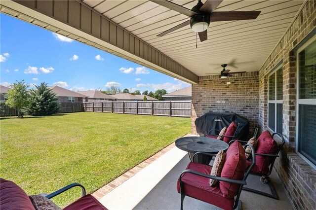 8320 Ogilvy Ct, Daphne, AL 36526 - view of patio with a fenced backyard, ceiling fan, and a grill