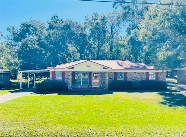 single story home with brick siding and a front lawn