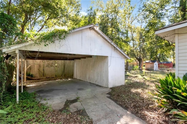 exterior space with a carport