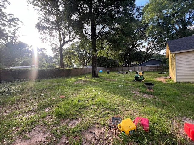 5470 Robert Jefferson Dr E, Theodore, AL 36582 - view of yard featuring an outdoor fire pit