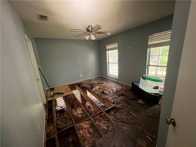 5470 Robert Jefferson Dr E, Theodore, AL 36582 - empty room with ceiling fan and baseboards