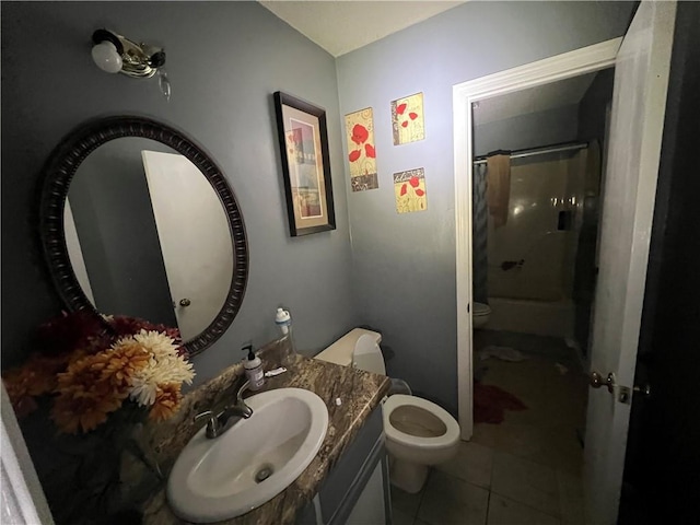 5470 Robert Jefferson Dr E, Theodore, AL 36582 - bathroom featuring toilet, a shower, vanity, and tile patterned flooring