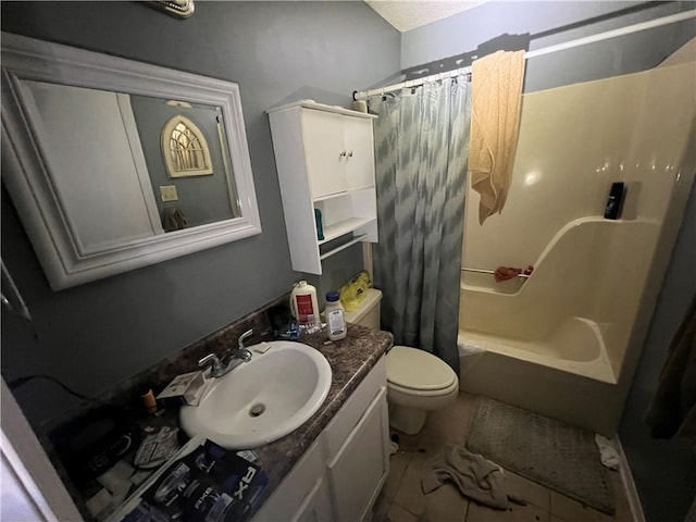 5470 Robert Jefferson Dr E, Theodore, AL 36582 - bathroom featuring vanity, toilet, shower / bath combo with shower curtain, and tile patterned flooring
