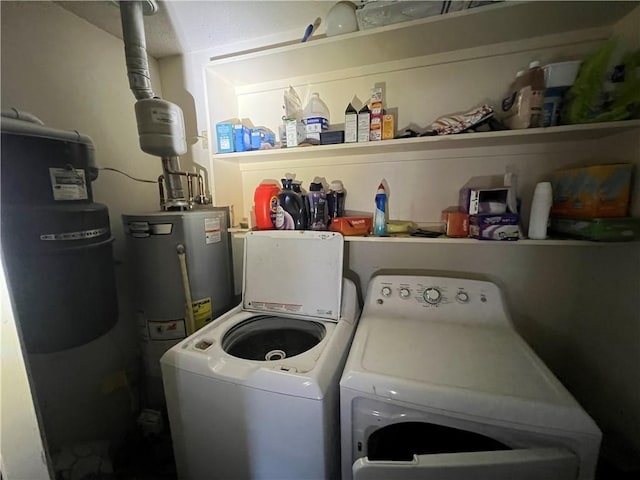 5470 Robert Jefferson Dr E, Theodore, AL 36582 - laundry area with washer and clothes dryer and water heater