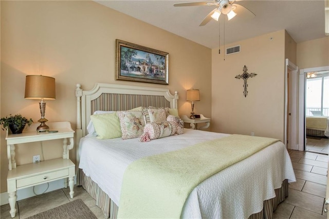 bedroom featuring ceiling fan, tile patterned flooring, and visible vents