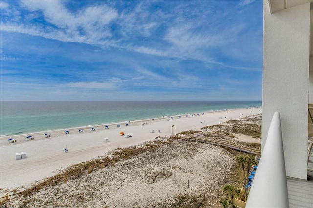 view of water feature with a beach view