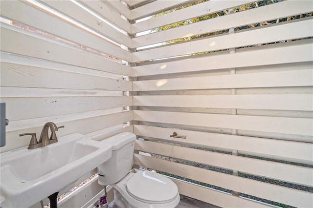 bathroom with toilet and sink