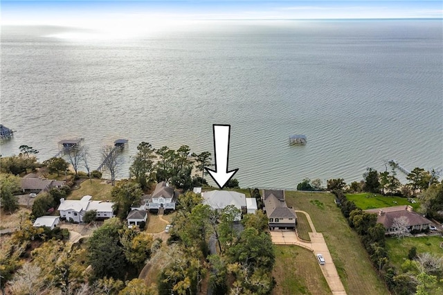 birds eye view of property featuring a water view